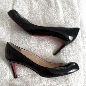 Christian Louboutin Black Heels with Signature Red Soles